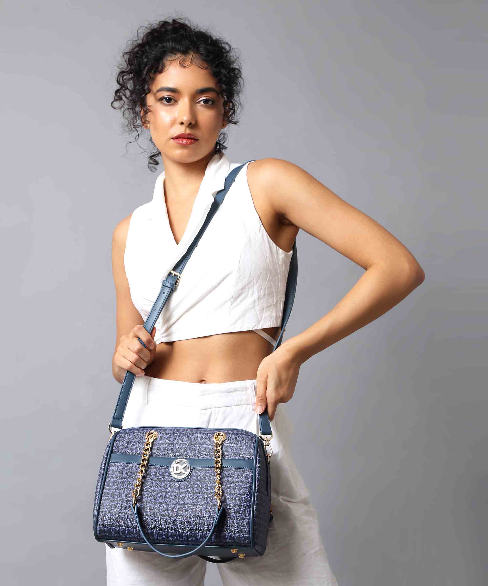 Luxurious Duffle Bag with Gold Chain Accent