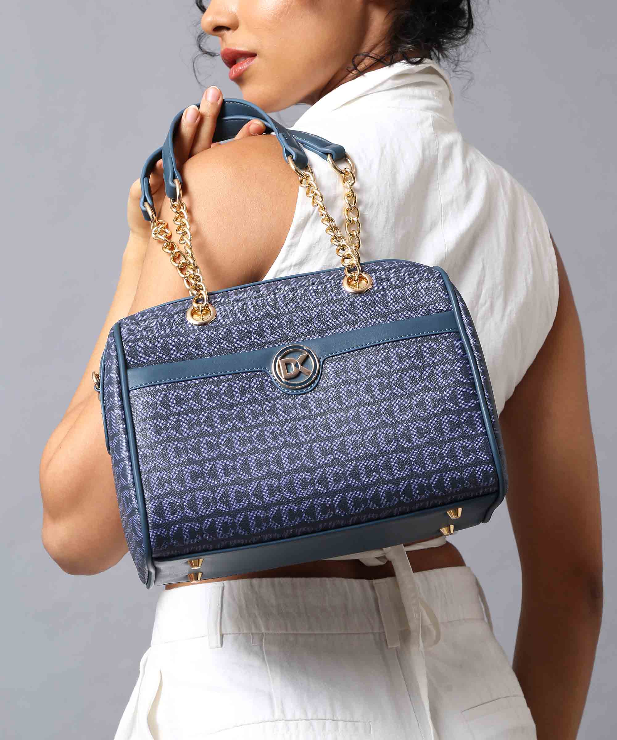 Luxurious Duffle Bag with Gold Chain Accent