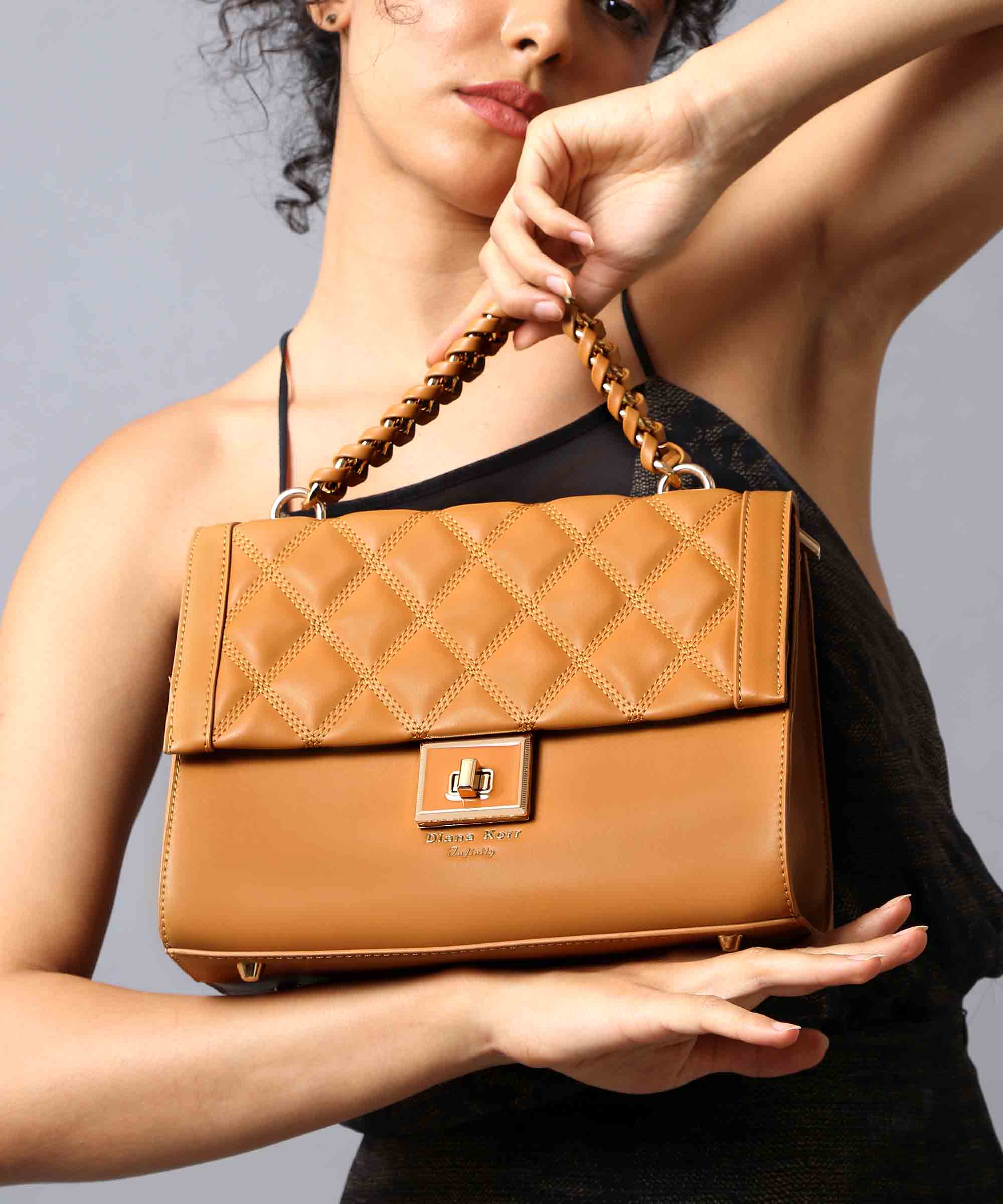 Stylish Top-Handle Bag with Quilted Detailing