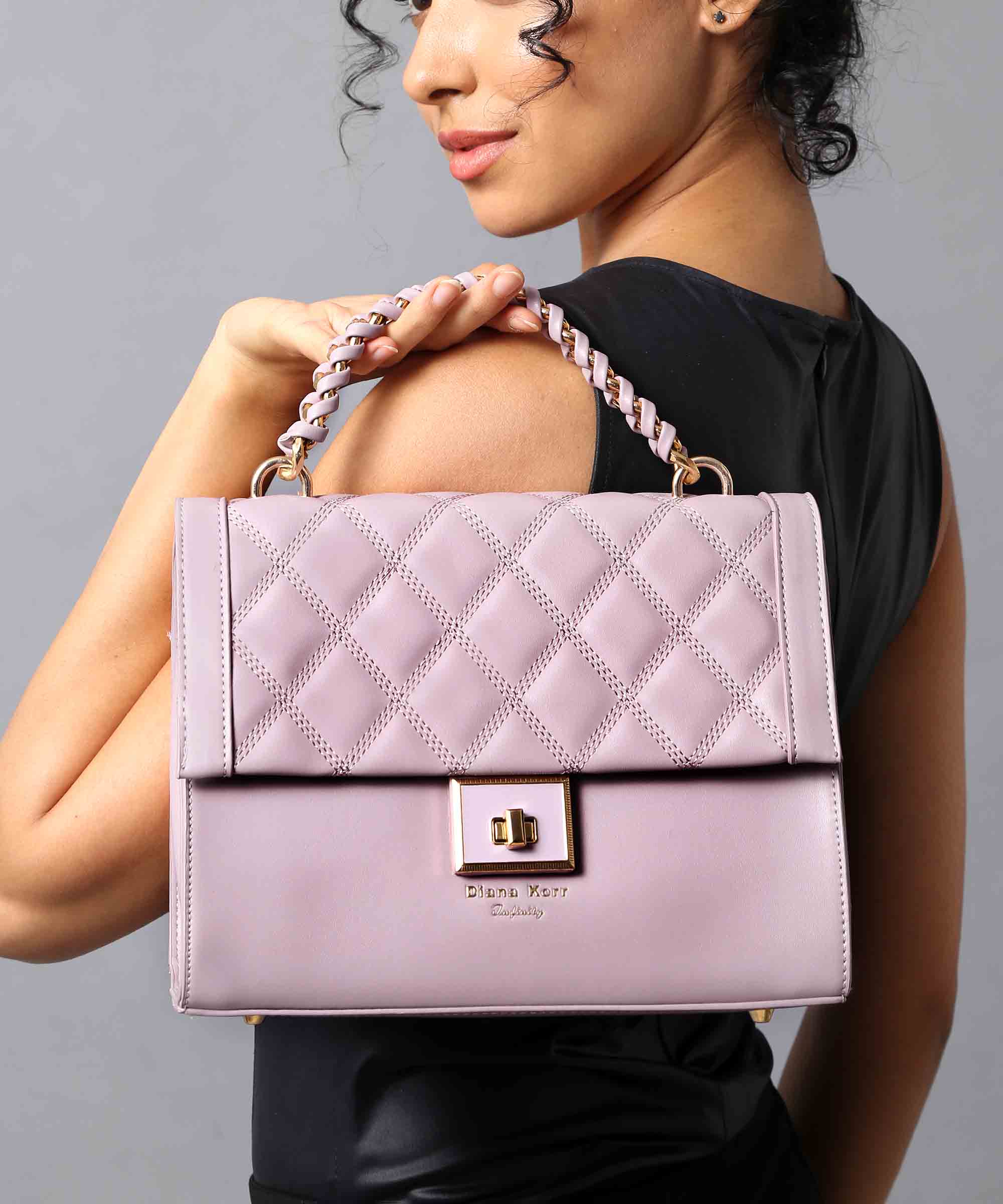 Stylish Top-Handle Bag with Quilted Detailing